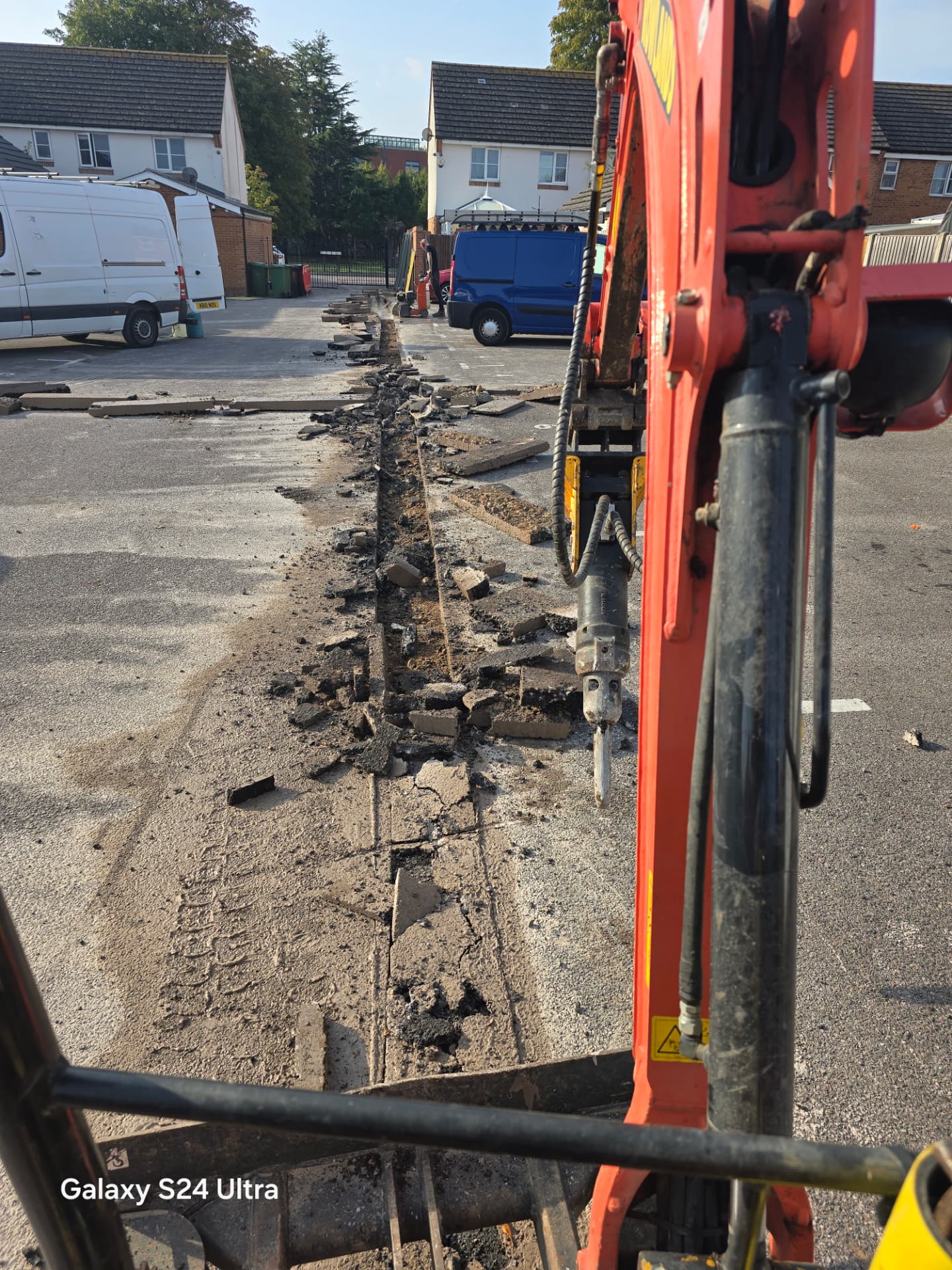 Excavated route through hardstanding during cable installation works in Portsmouth